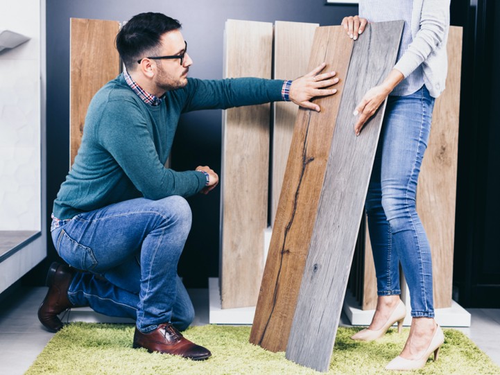 Man showing flooring products | Andrews Flooring LLC